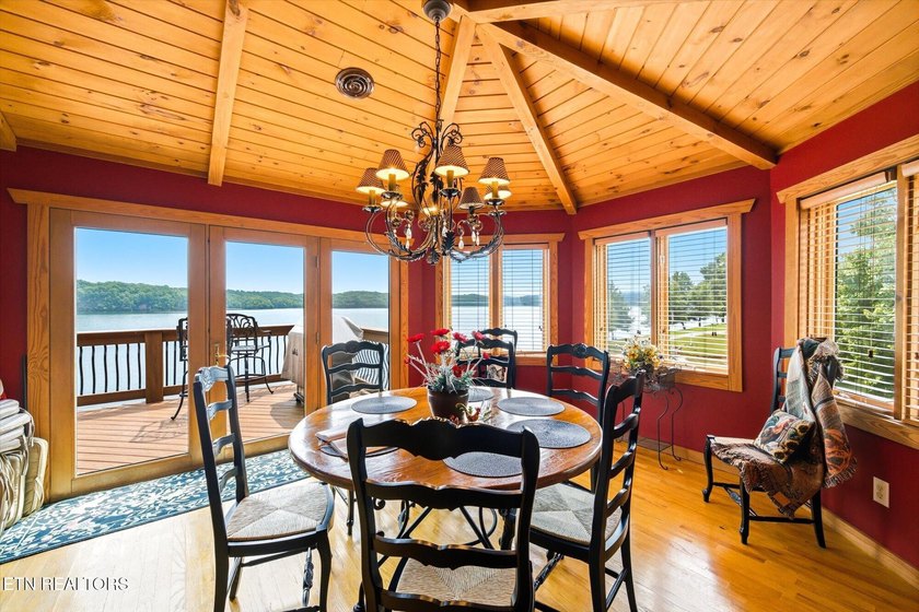 Stunning log home on the main channel of Douglas Lake! This - photo 19