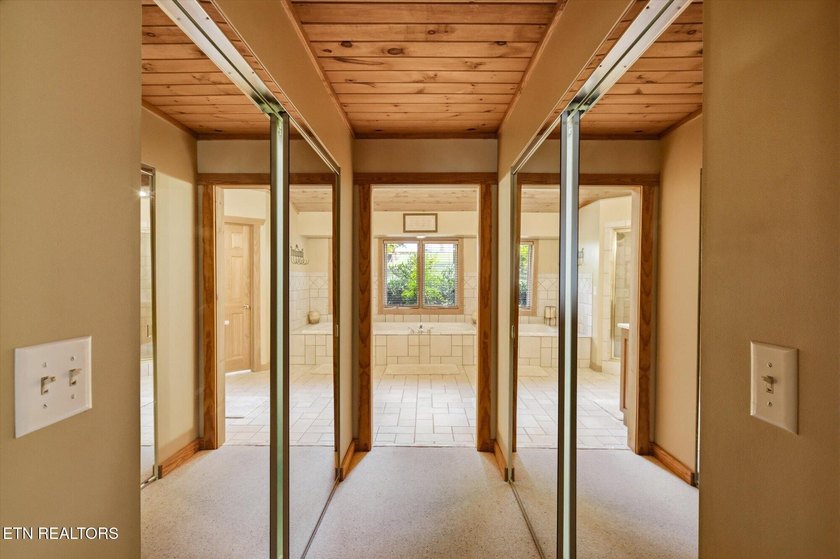Stunning log home on the main channel of Douglas Lake! This - photo 23