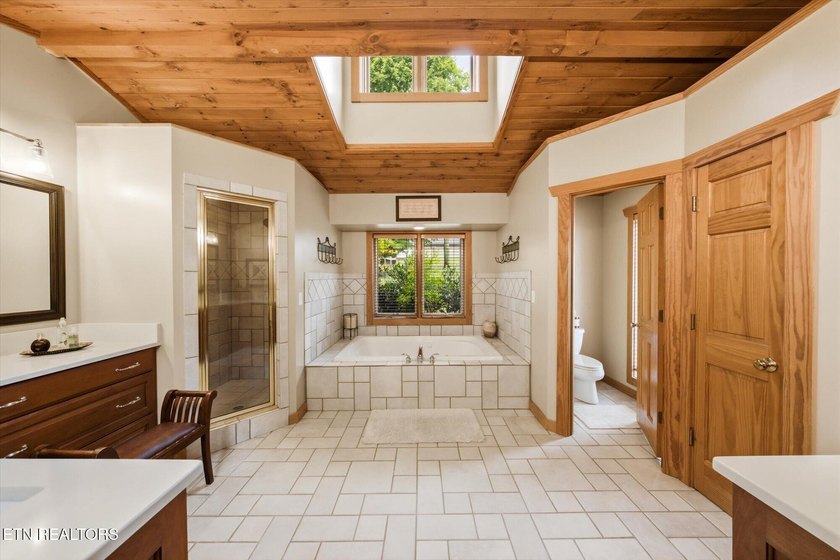Stunning log home on the main channel of Douglas Lake! This - photo 24