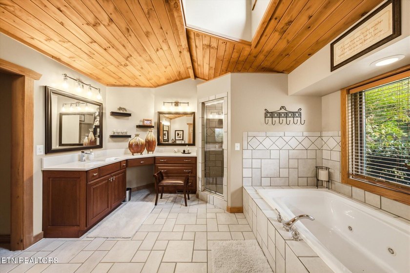 Stunning log home on the main channel of Douglas Lake! This - photo 25