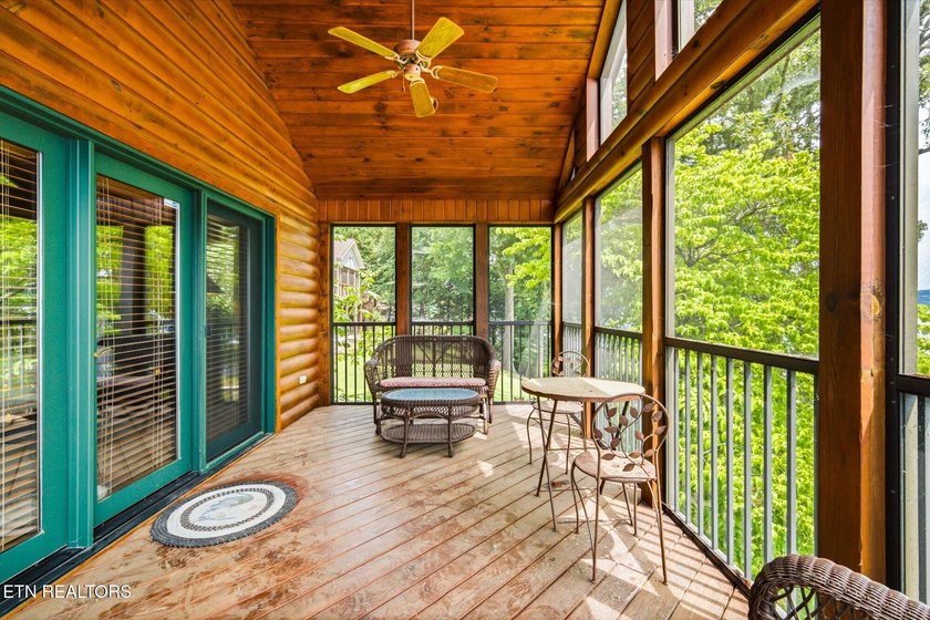 Stunning log home on the main channel of Douglas Lake! This - photo 29