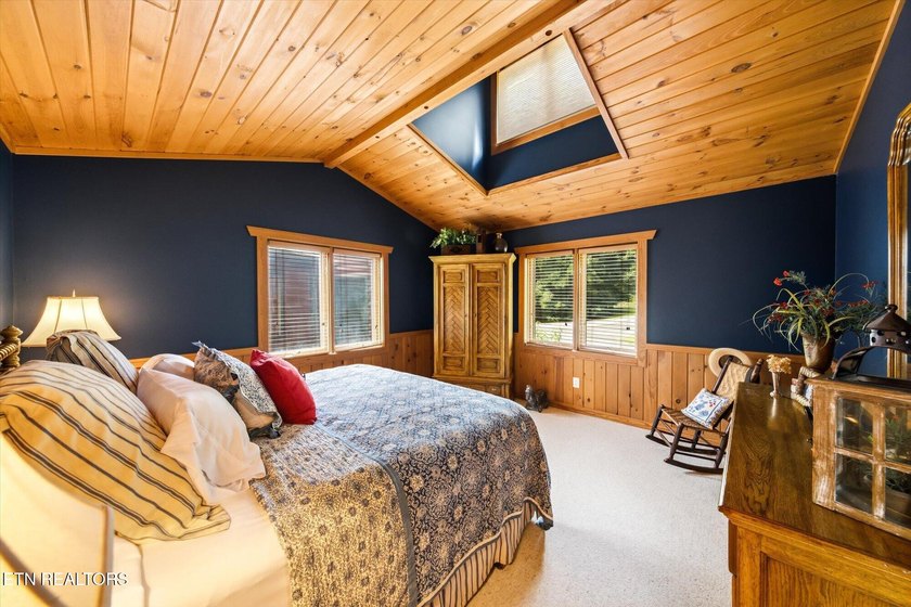 Stunning log home on the main channel of Douglas Lake! This - photo 34