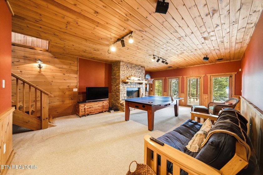 Stunning log home on the main channel of Douglas Lake! This - photo 40