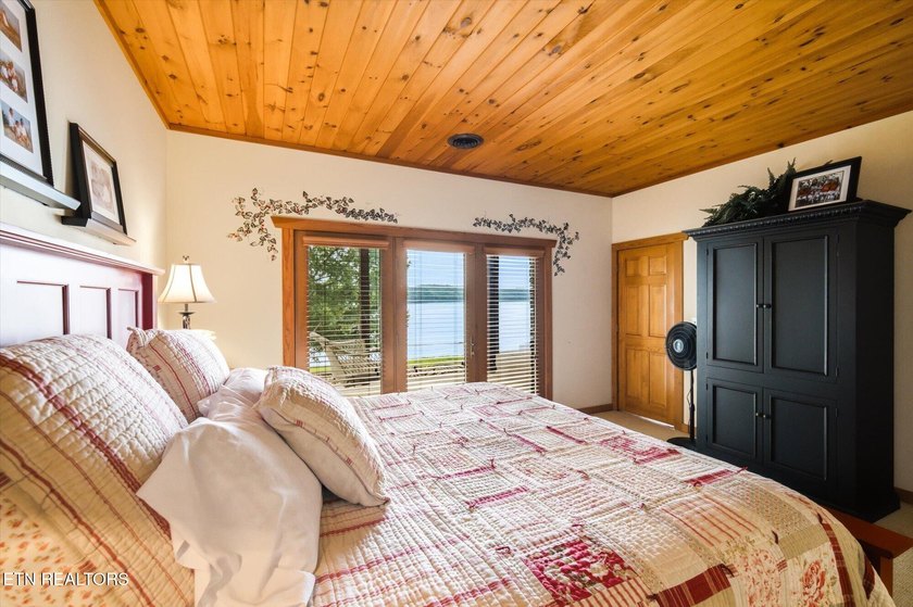 Stunning log home on the main channel of Douglas Lake! This - photo 42