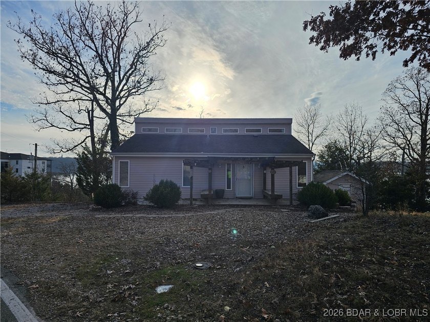 Experience Lake of the Ozarks living at its best in this - photo 2