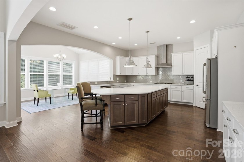 This beautiful single-family home is nestled in the heart of - photo 3