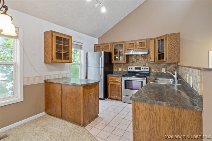Experience Lake of the Ozarks living at its best in this - photo 10