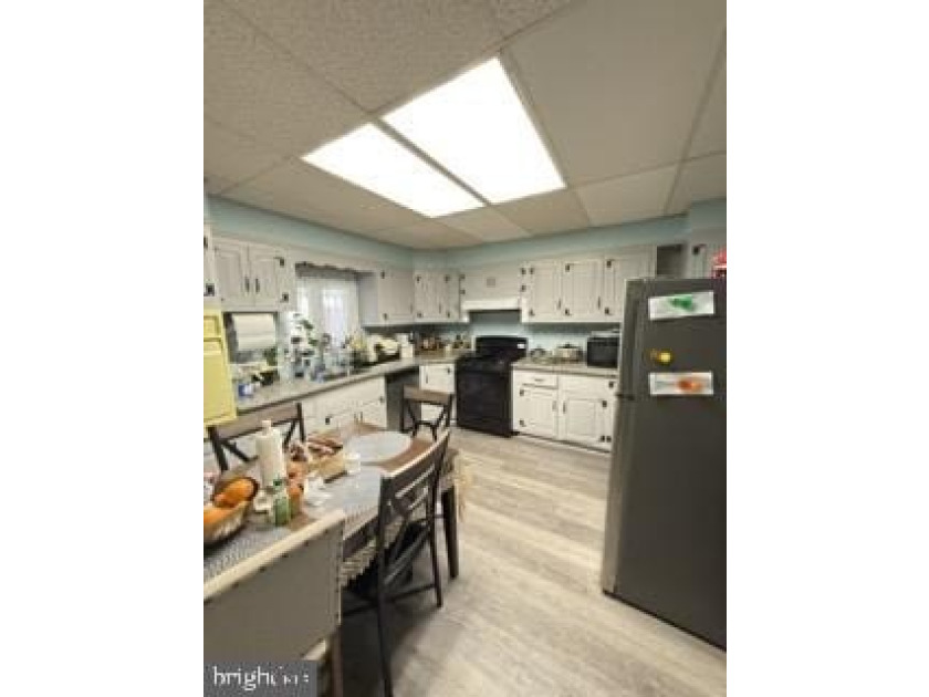 Welcome to a recently renovated 4-bedroom, 1.5-bath home located - photo 3