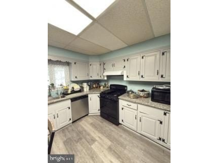 Welcome to a recently renovated 4-bedroom, 1.5-bath home located - photo 4