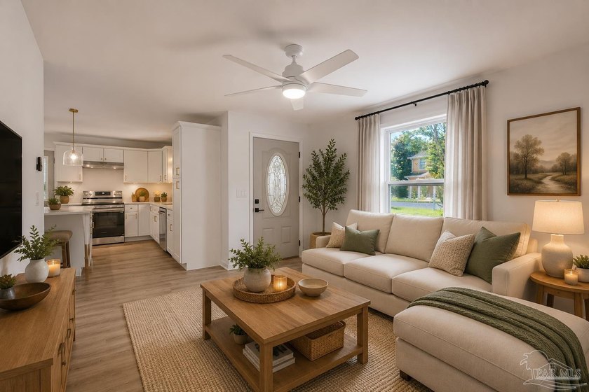 Beautifully renovated and move-in ready! This stunning 4-bedroom - photo 3