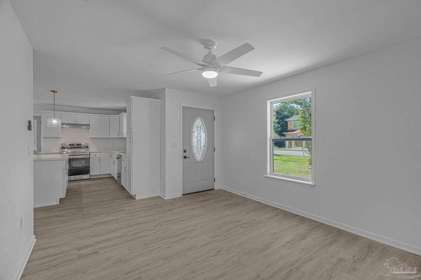 Beautifully renovated and move-in ready! This stunning 4-bedroom - photo 4