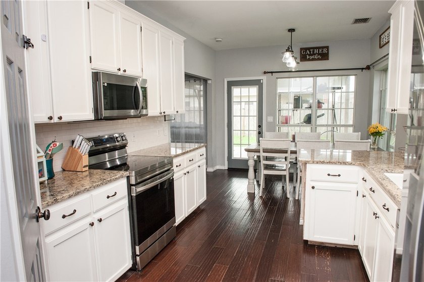 **Motivated Seller!** Spacious, updated, and move-in ready, this - photo 11