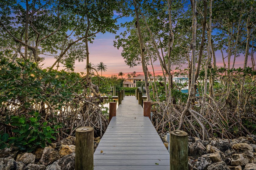 This gorgeous riverfront home boasts 100 feet of water frontage - photo 11