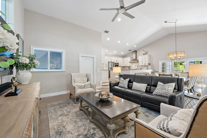 This gorgeous riverfront home boasts 100 feet of water frontage - photo 12