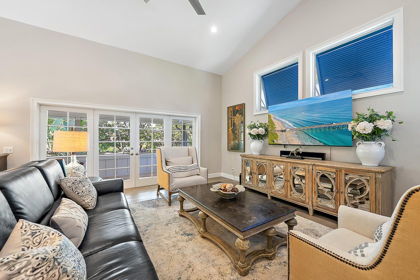 This gorgeous riverfront home boasts 100 feet of water frontage - photo 13