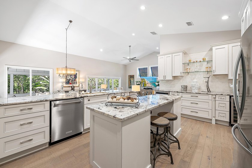 This gorgeous riverfront home boasts 100 feet of water frontage - photo 14