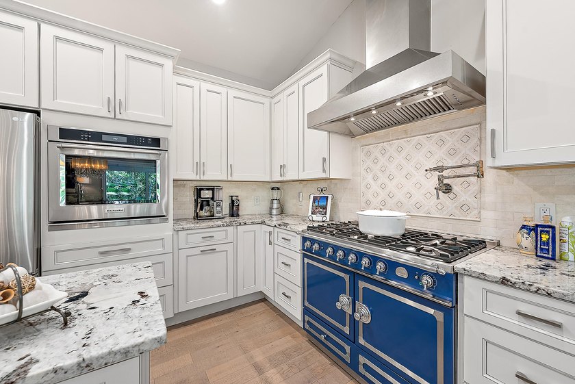 This gorgeous riverfront home boasts 100 feet of water frontage - photo 15