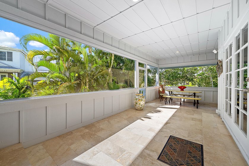 This gorgeous riverfront home boasts 100 feet of water frontage - photo 17