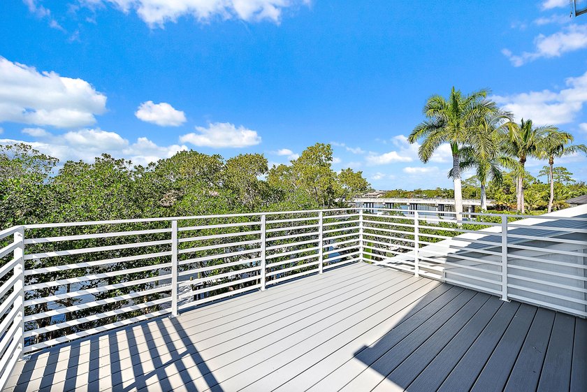 This gorgeous riverfront home boasts 100 feet of water frontage - photo 18