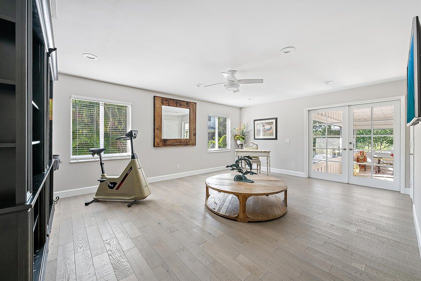 This gorgeous riverfront home boasts 100 feet of water frontage - photo 28
