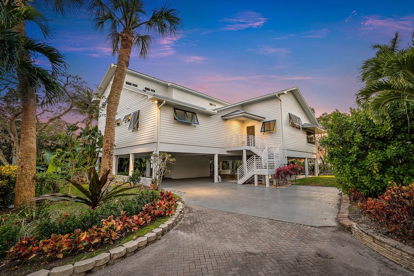 This gorgeous riverfront home boasts 100 feet of water frontage - photo 39