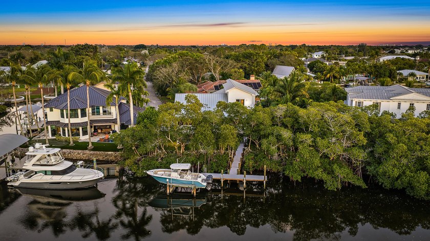 This gorgeous riverfront home boasts 100 feet of water frontage - photo 42