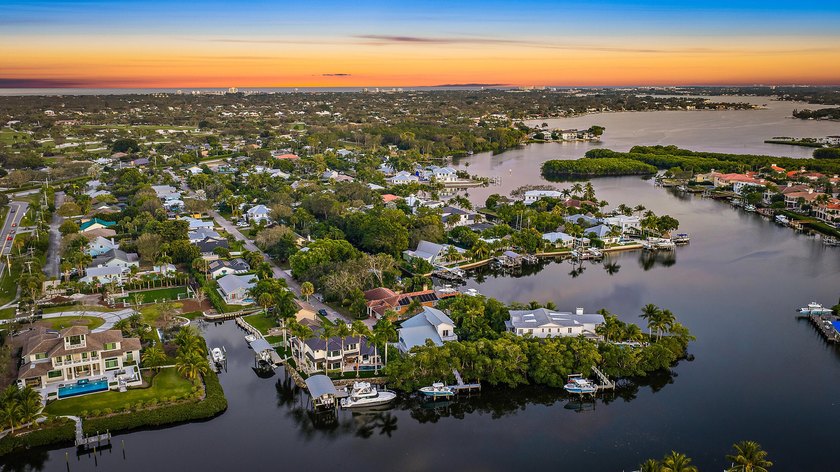 This gorgeous riverfront home boasts 100 feet of water frontage - photo 44