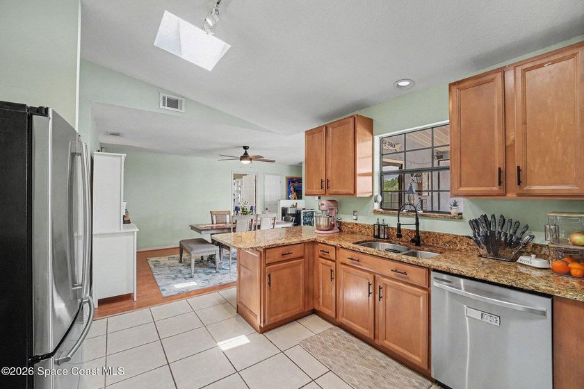 Welcome home to this well-maintained retreat nestled on a quiet - photo 9