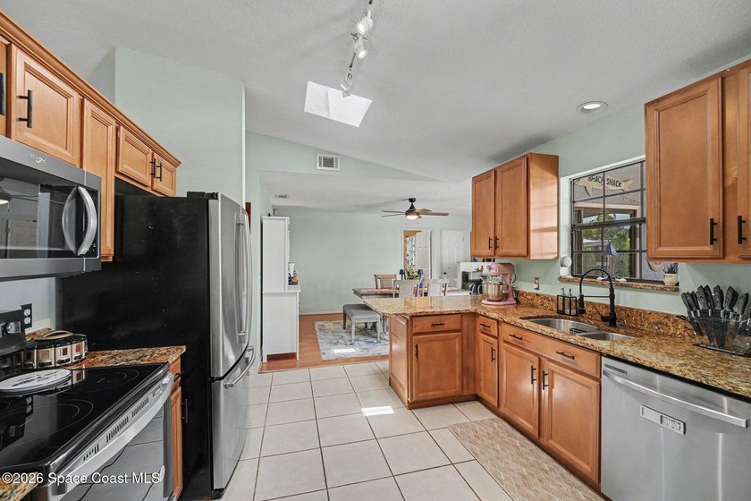 Welcome home to this well-maintained retreat nestled on a quiet - photo 10