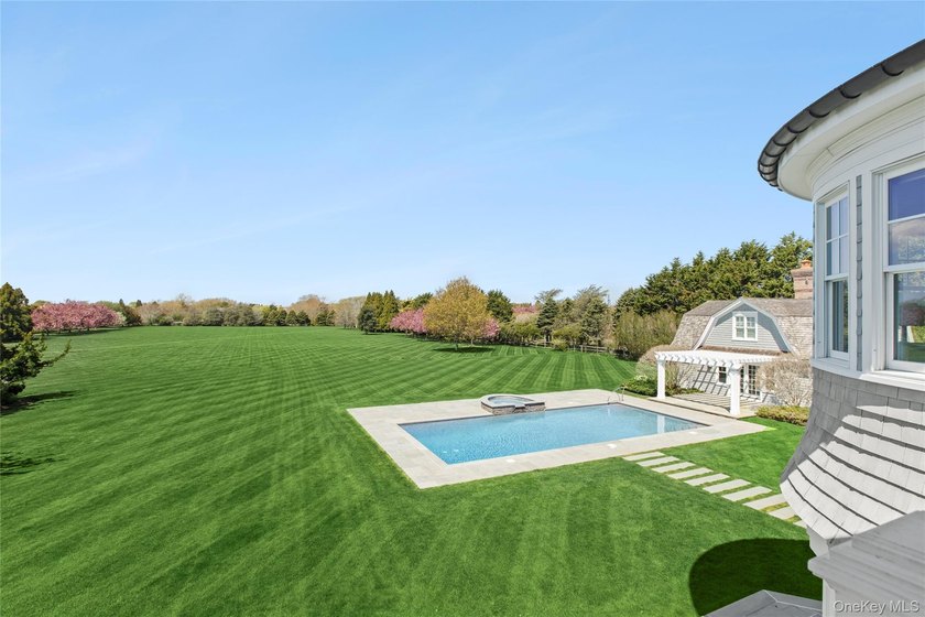 Beyond a gated approach and long gravel drive, 672 Halsey Lane - photo 23