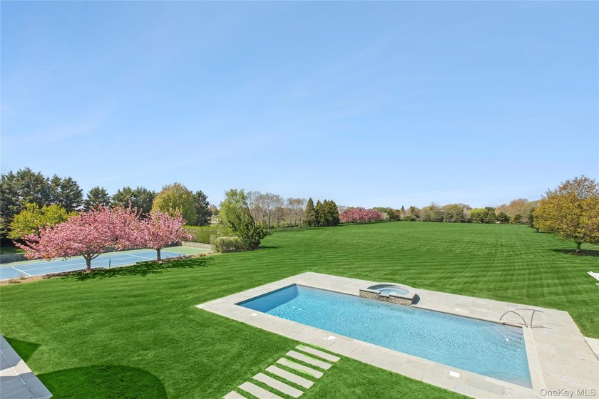 Beyond a gated approach and long gravel drive, 672 Halsey Lane - photo 29