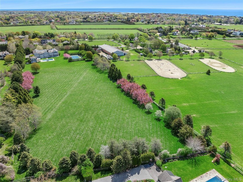 Beyond a gated approach and long gravel drive, 672 Halsey Lane - photo 49