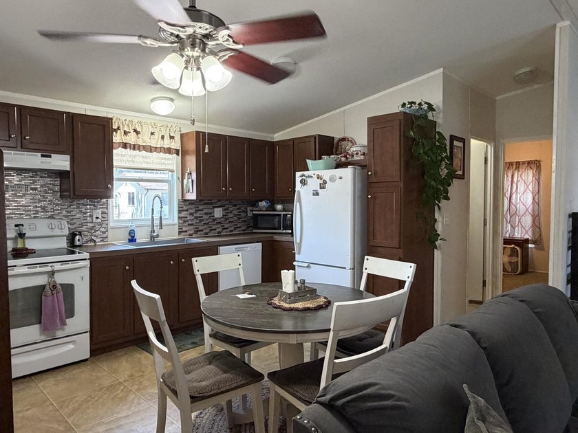 Welcome home to this clean, well maintained 2008 manufactured - photo 8