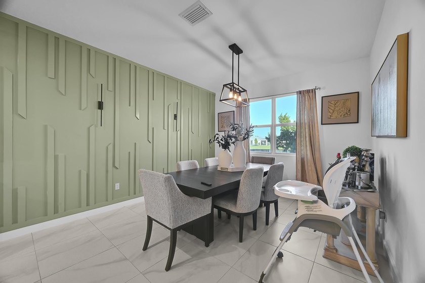 Welcome to this exceptional 4-bedroom, 3-bathroom single-family - photo 13