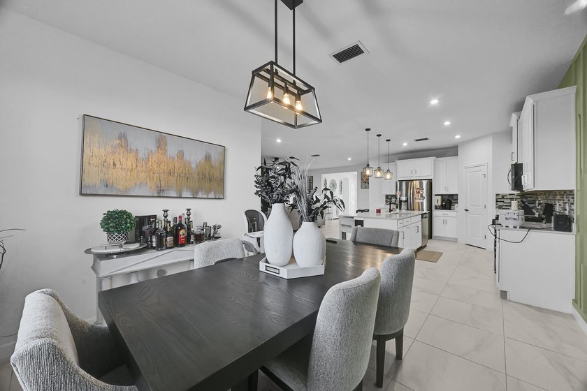Welcome to this exceptional 4-bedroom, 3-bathroom single-family - photo 14
