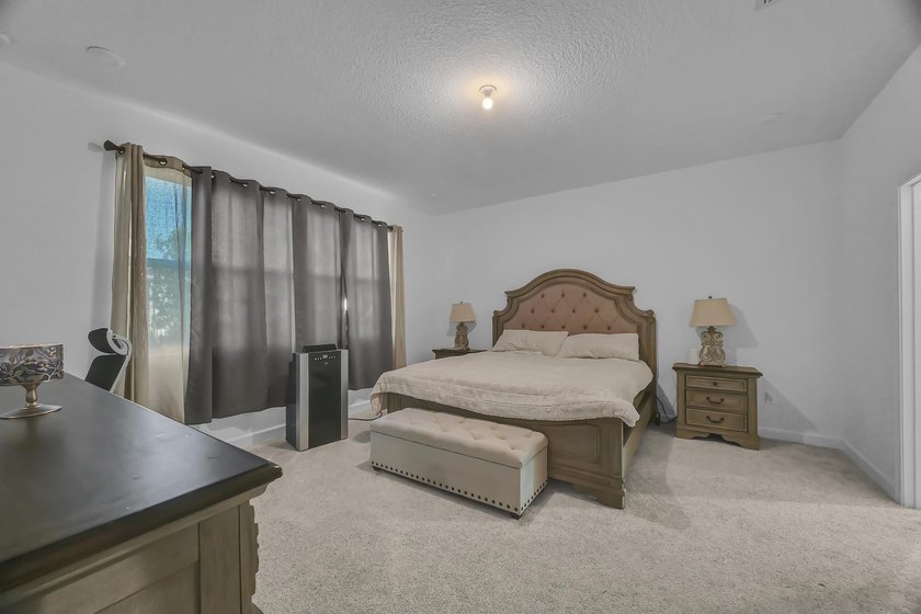 Welcome to this exceptional 4-bedroom, 3-bathroom single-family - photo 19