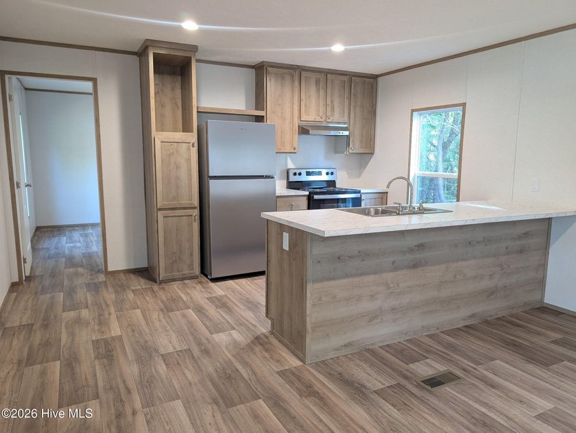 Brand-New 2026 Home in the Gated, HOA Community of River Run - photo 8