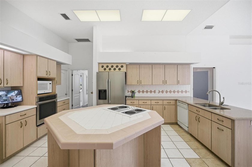 Spacious custom pool home situated on an oversized lot in the - photo 14