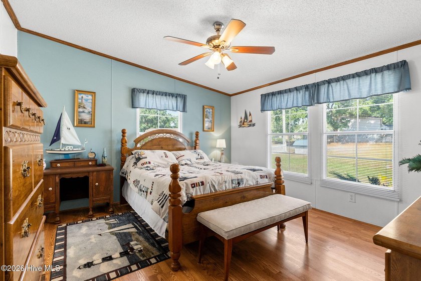 Enjoy coastal living just minutes from the sandy shores of - photo 19