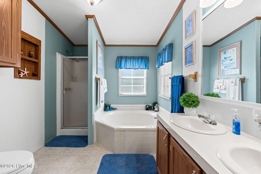 Enjoy coastal living just minutes from the sandy shores of - photo 22
