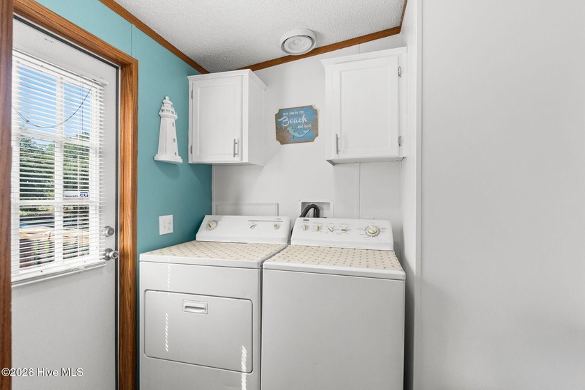 Enjoy coastal living just minutes from the sandy shores of - photo 24