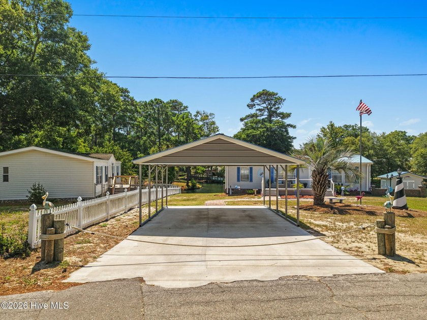 Enjoy coastal living just minutes from the sandy shores of - photo 28