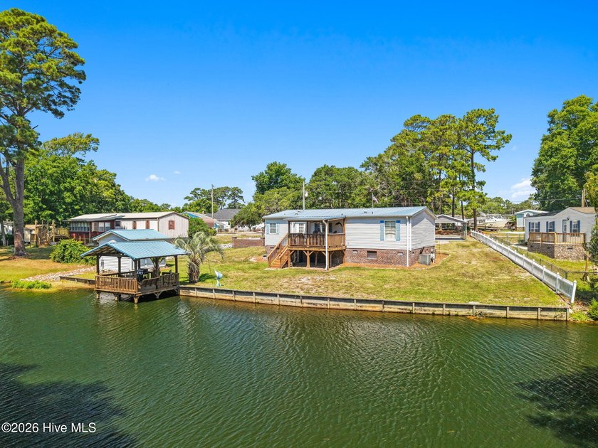 Enjoy coastal living just minutes from the sandy shores of - photo 30