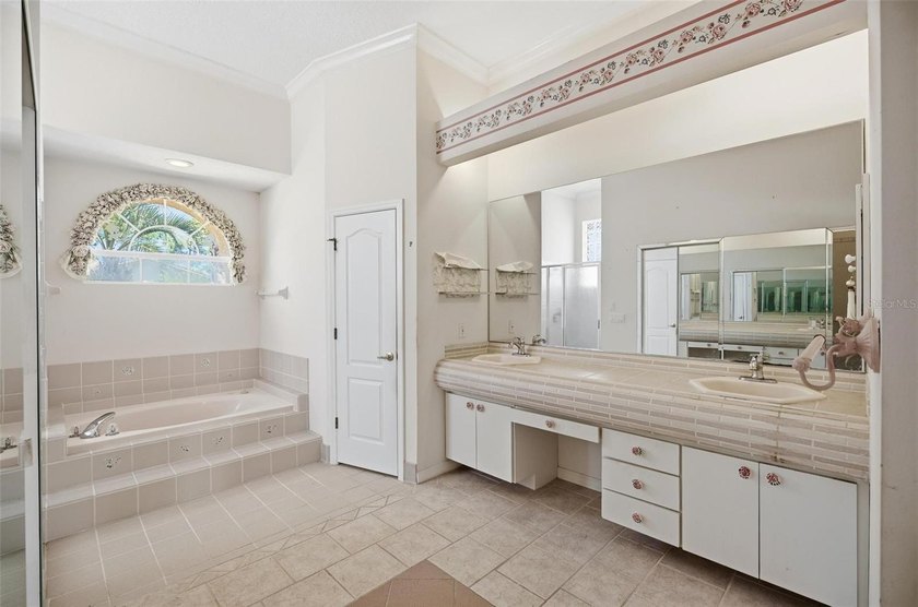 Spacious custom pool home situated on an oversized lot in the - photo 33