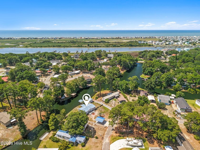 Enjoy coastal living just minutes from the sandy shores of - photo 40
