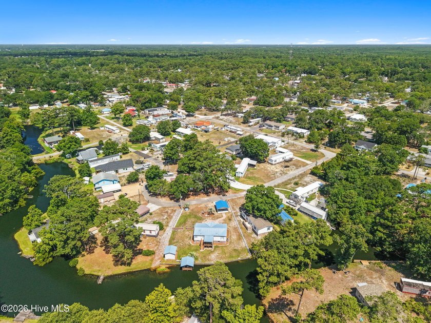 Enjoy coastal living just minutes from the sandy shores of - photo 42