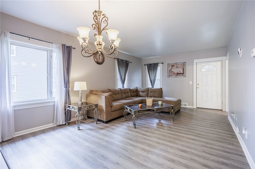 This charming home is nestled in Rochester's beloved Charlotte - photo 4