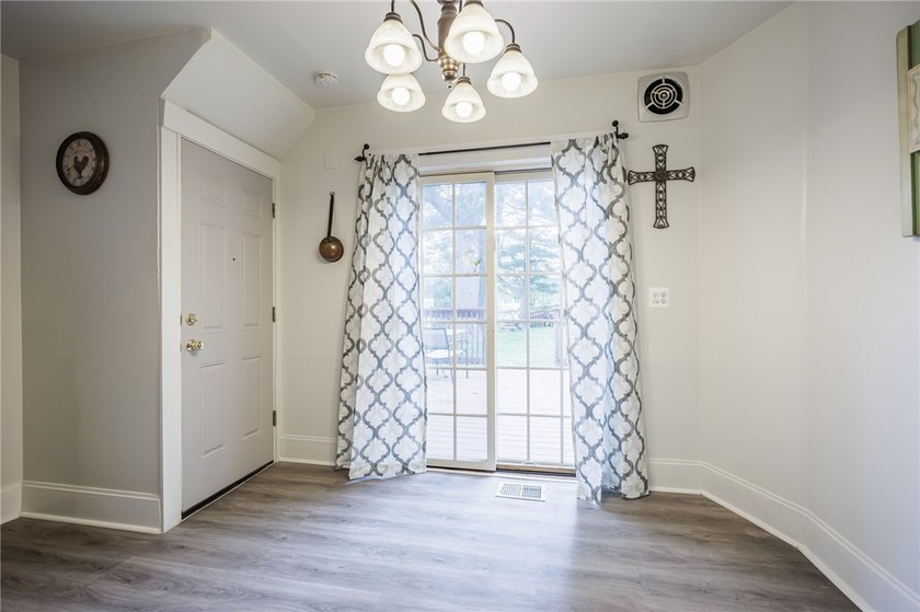 This charming home is nestled in Rochester's beloved Charlotte - photo 10