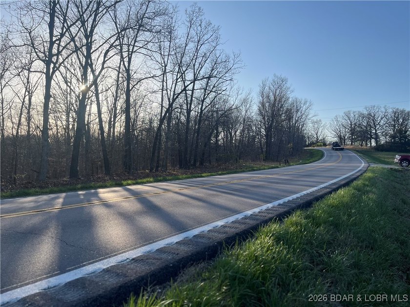 This Great Location 6.65 acre tract of land is conveniently - photo 2