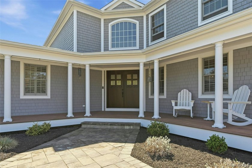 Tucked at the end of a long, private drive on one of Southold's - photo 3